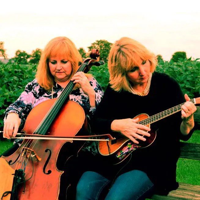 Tish and Laurie playing together